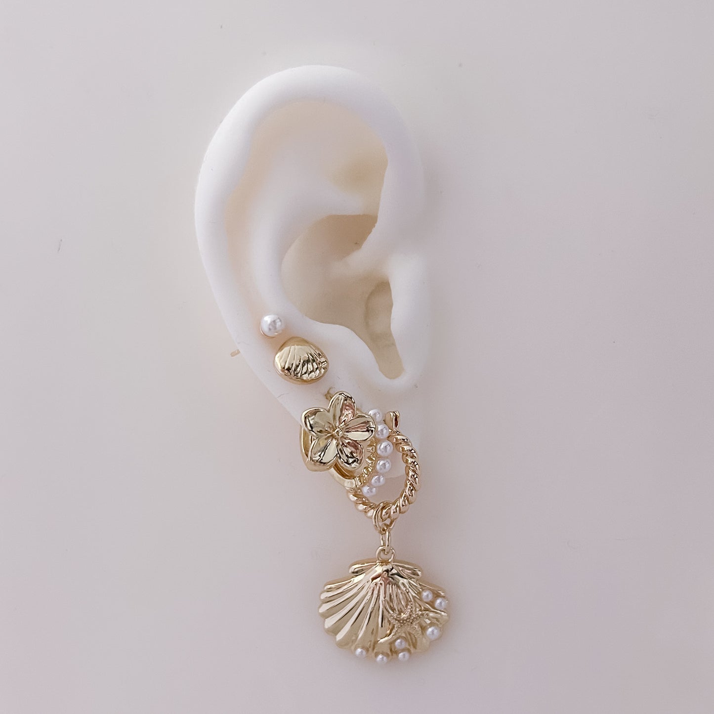 Pearls Shells Twisted Hoop