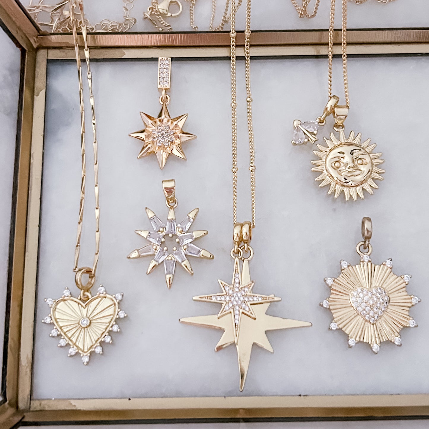 Gold Starburst Charm