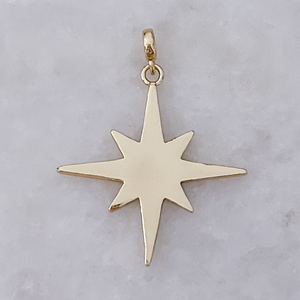 Gold Starburst Charm