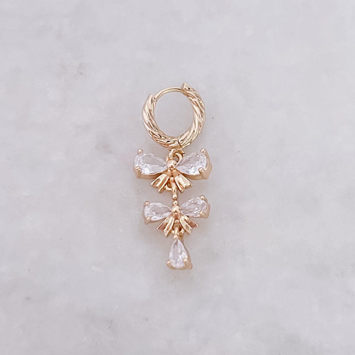 Tiny Twisted Bow Hoop