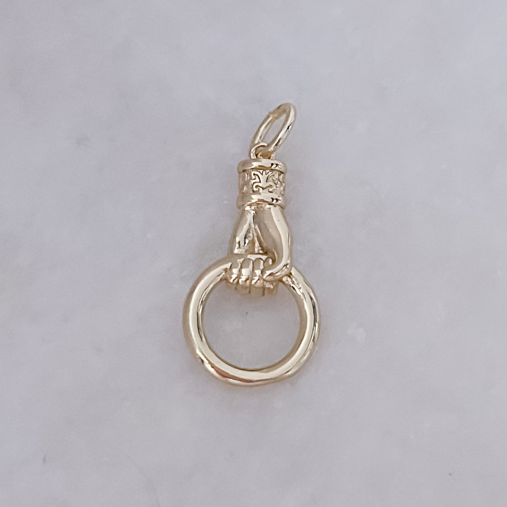 Grip of Strength - Charm